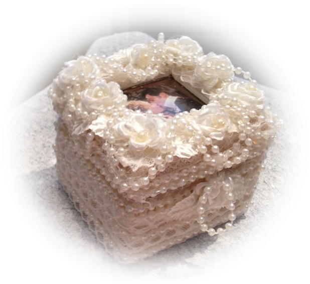  hand made wedding ring box  Is upholstered in an off white lace with pearls and roses.