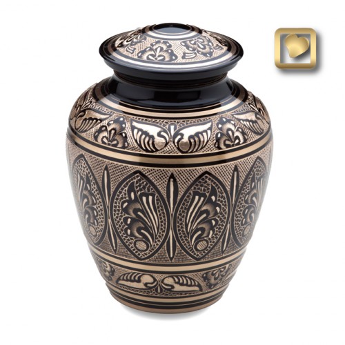 Ornate brass and black keepsake urn