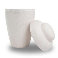 White vase shaped biodegradable urn opened