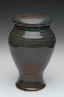 brown and green ceramic urn