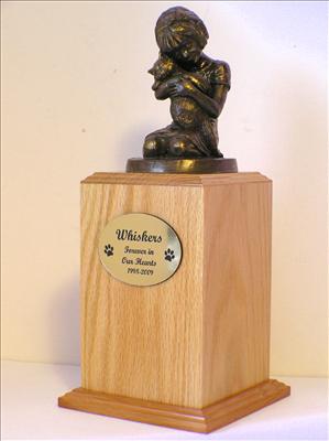 Oak Wood Always My Kitty Cat Urn. with bronze sculpture of a girl holding a kittin