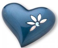 blue heart keepsake urn with stone and flowers