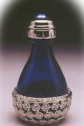  cobalt glass tear bottle with pewter basket