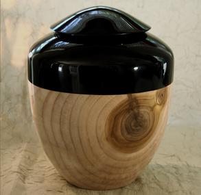 cremation urn made from solid piece of poplar wood