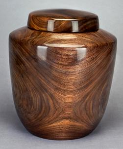 Cremation urn made from solid piece of black walnut wood