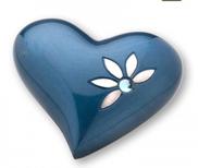 blue heart keepsake urn with stone and flowers