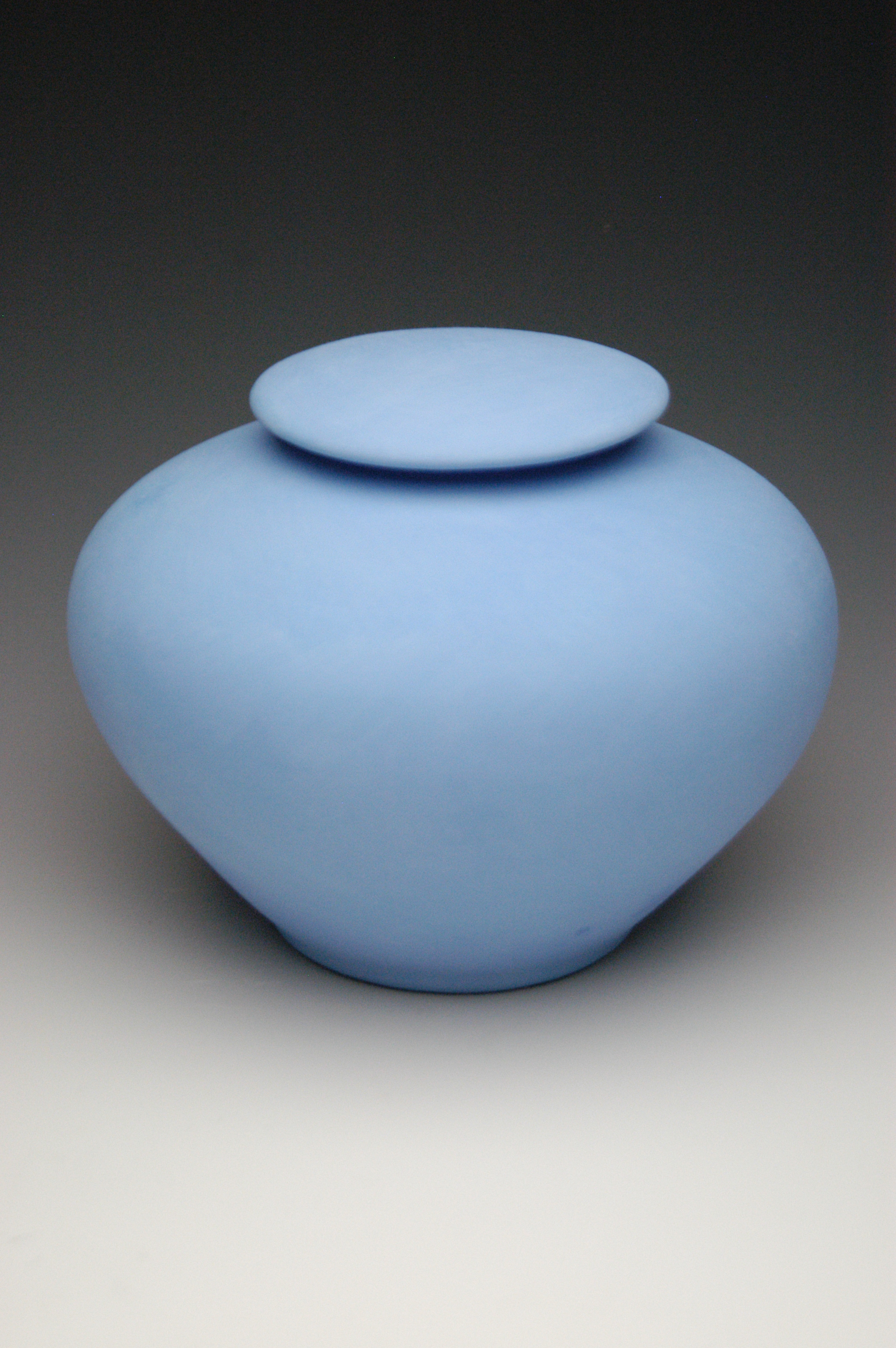 Pastel blue biodegadable cremation urn
