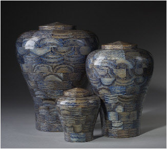 Blue dyed exotic wood cremation urns