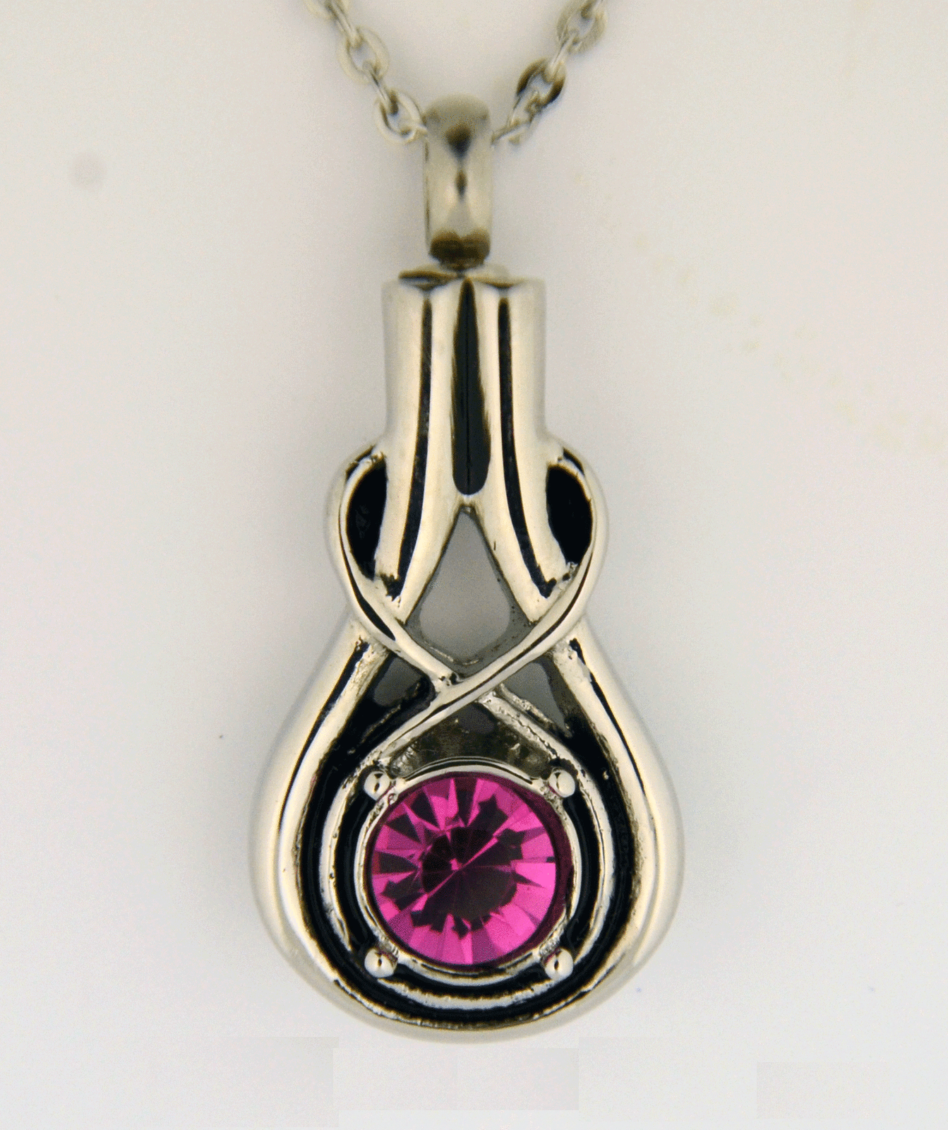 Figure 8 Pink Stone Cremation Jewelry Urn and Necklace